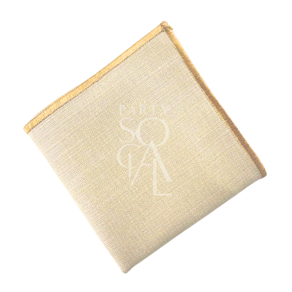 Bleached sand napkin with a luxurious gold line border, combining the soft sand tone with a touch of opulence. The gold-lined accent adds a sophisticated and elegant touch, ideal for elevating any dining experience.