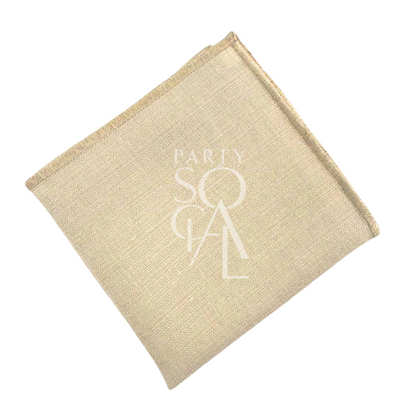 Bleached sand napkin with a subtle sand line border, featuring a warm and earthy tone. The sand-lined detail adds a natural and understated elegance, perfect for a rustic or neutral-themed table setting.