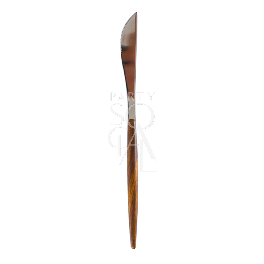 A wooden dinner knife with a silver finish, showcasing a sleek and functional design. This elegant knife adds a touch of sophistication to your dining experience, blending the natural appeal of wood with the polished look of silver.