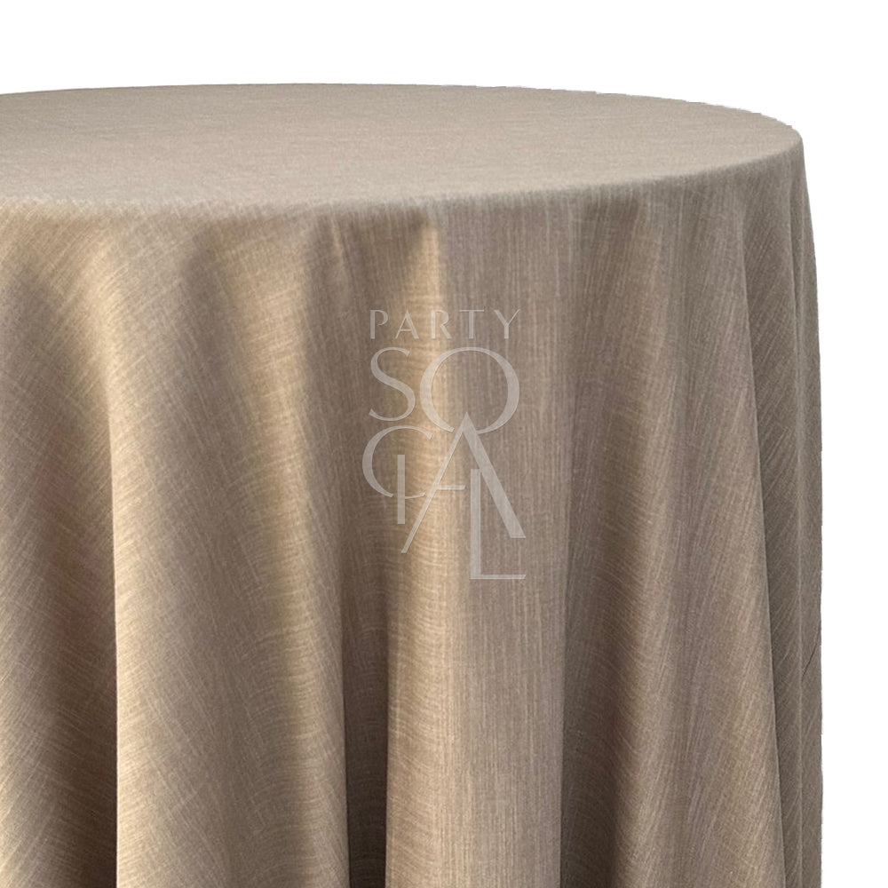 Round linen blend tablecloth in dark sand, featuring a rich and natural tone. The dark sand color adds an earthy and refined touch, ideal for a rustic or elegant table setting.