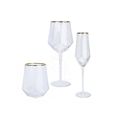 Gold-rimmed geometric glasses featuring a chic and contemporary design. These glasses have a clear body with striking geometric shapes, complemented by a sophisticated gold rim. Perfect for adding a touch of elegance and modern flair to your table setting, ideal for both formal and casual occasions.