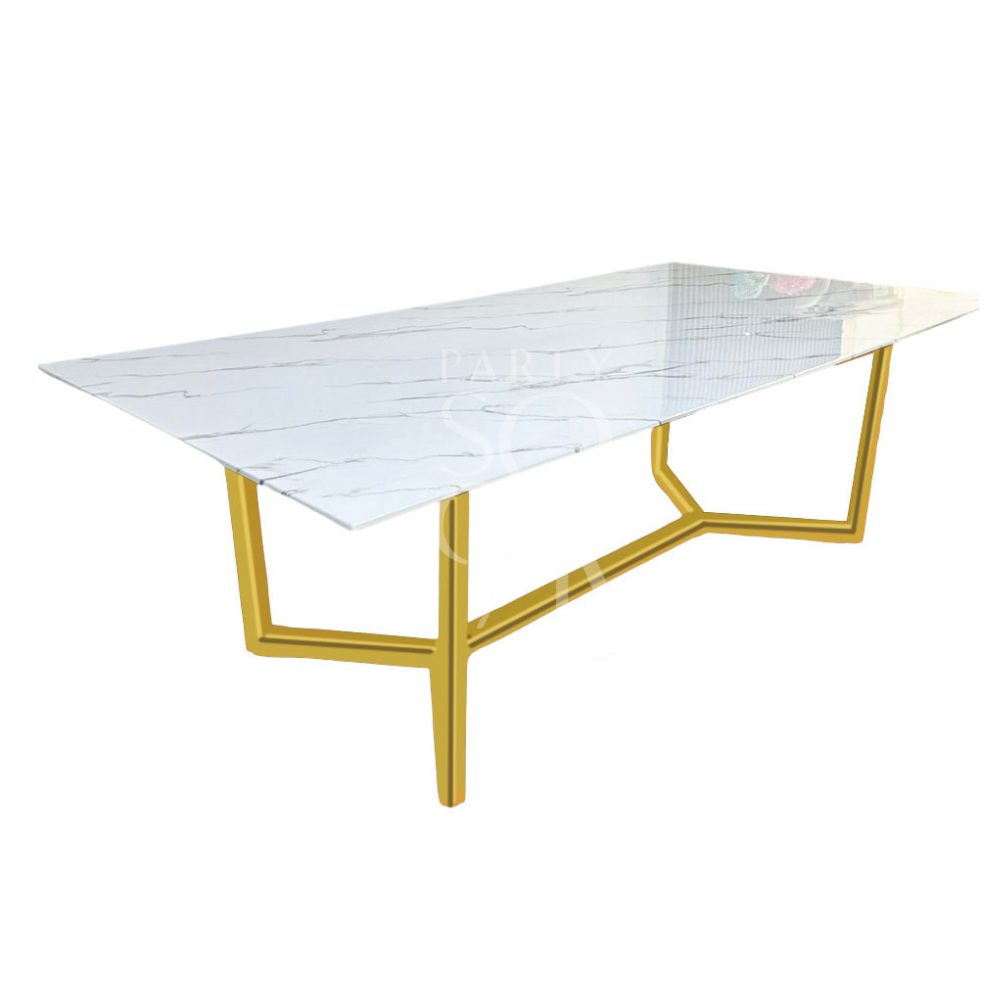 A table with a gold base and a white marble top, featuring a luxurious and elegant design. The gold base adds a touch of opulence, while the white marble top provides a classic and sophisticated finish. This striking combination enhances any decor with its refined and glamorous look.