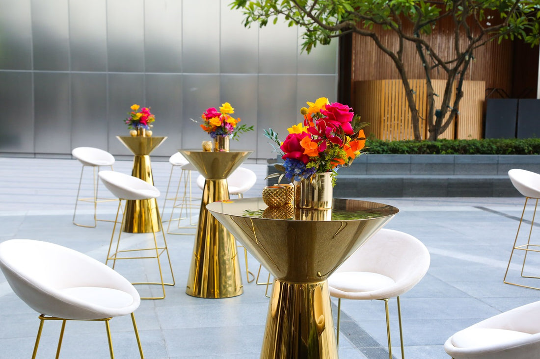 Gold mirror cocktail tables, featuring a luxurious design with reflective gold surfaces. These elegant tables add a touch of sophistication and glamour to any space, making them perfect for enhancing living rooms, lounges, or event areas with a stylish and functional centerpiece.