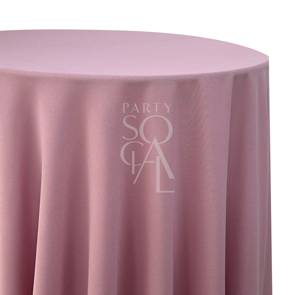 Round cotton linen tablecloth in lilac, featuring a soft and romantic hue. The lilac color adds a delicate and charming touch, perfect for a gentle and inviting table setting.