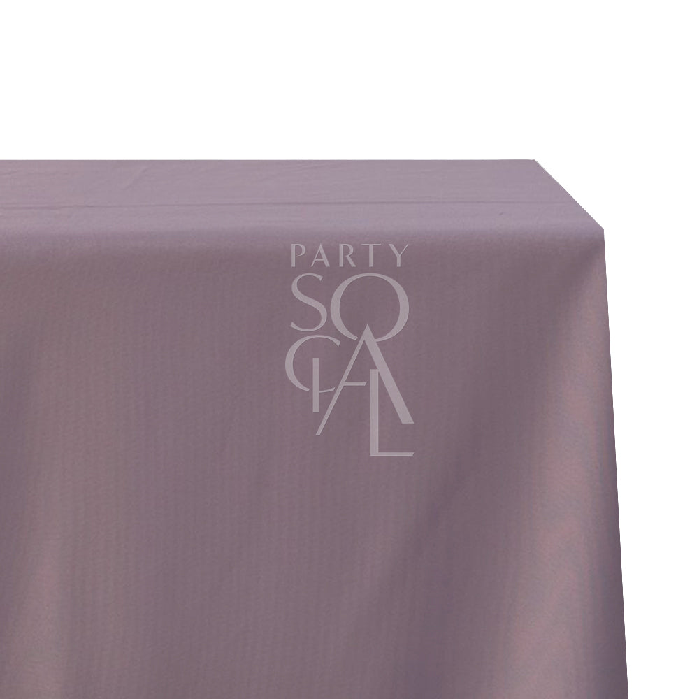 A rectangular cotton-linen tablecloth in delicate lilac, featuring a light and soothing color. This elegant tablecloth adds a touch of grace and serenity to your dining area, perfect for enhancing your decor for various occasions.