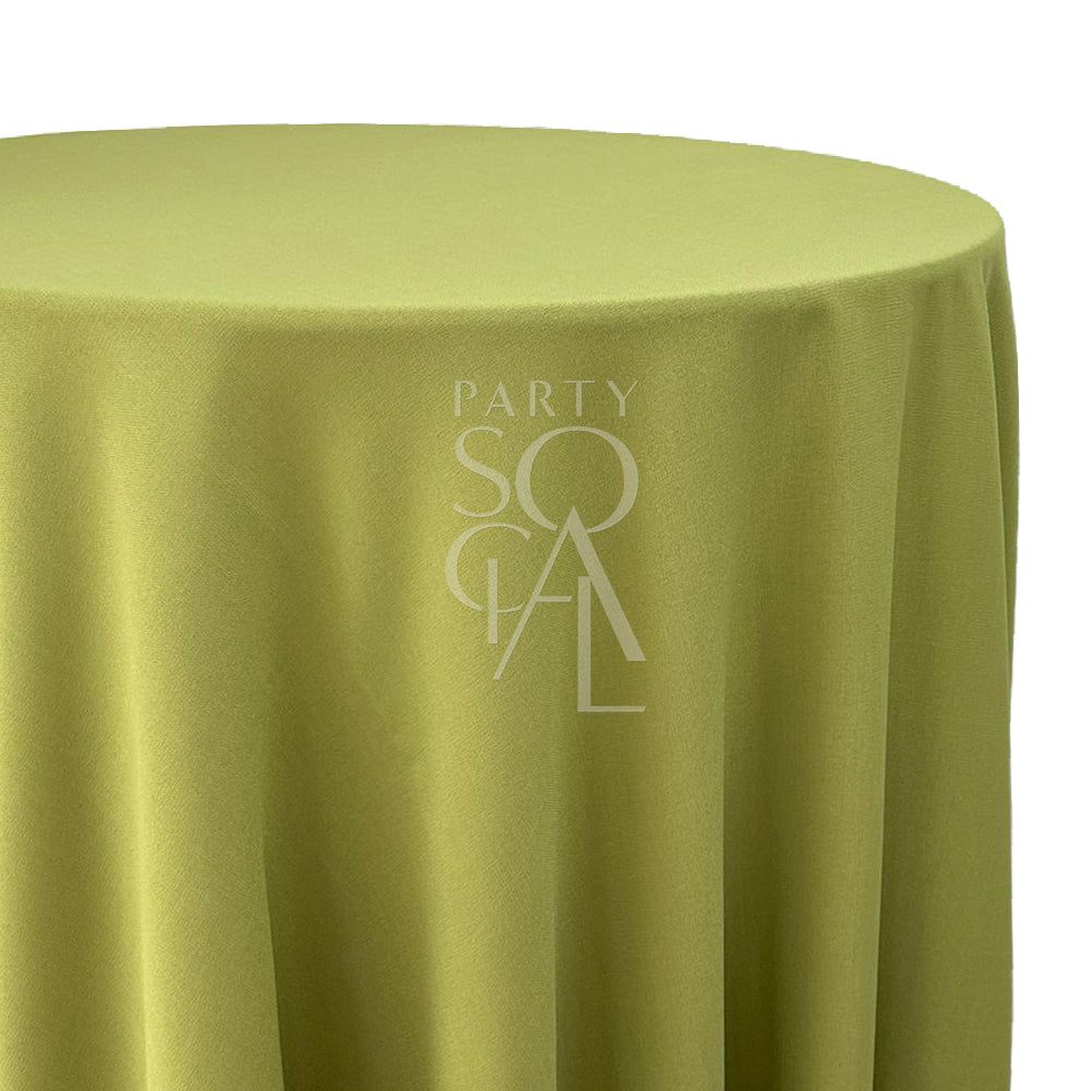 Round cotton linen tablecloth in lime green, offering a bright and lively tone. The lime green color adds a fresh and vibrant touch, perfect for energizing any table setting.