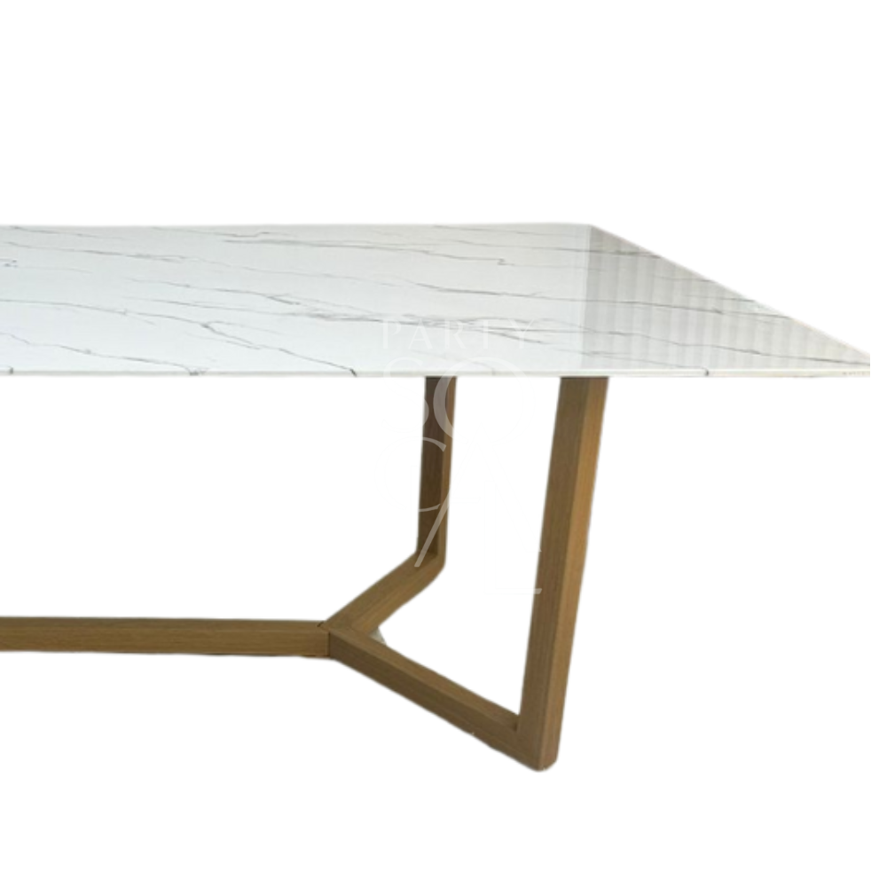 A table with a natural base and a white marble top, featuring a harmonious and elegant design. The natural base adds warmth and an earthy touch, while the white marble top provides a clean and sophisticated finish. This table creates a refined and stylish focal point for any decor.