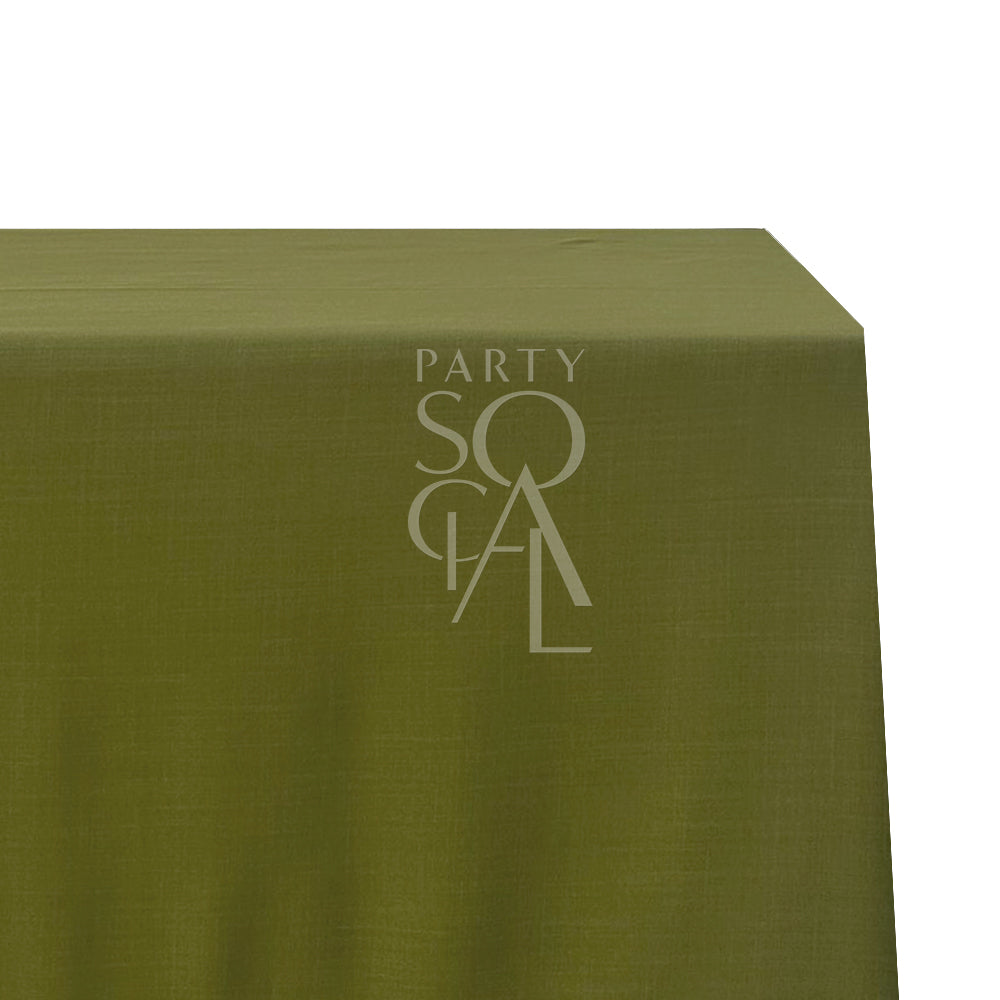 A rectangular cotton-linen tablecloth in rich olive green, with a deep and earthy color. This elegant tablecloth adds a touch of sophistication and warmth to your dining area, ideal for enhancing your decor with a natural, refined look.