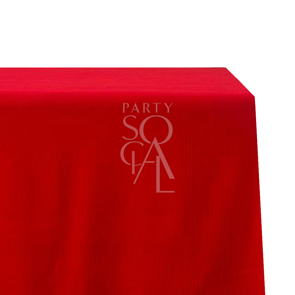 A rectangular cotton-linen tablecloth in vibrant red, with a bold and eye-catching color. This dynamic tablecloth adds a touch of excitement and elegance to your dining setting, ideal for festive events and special celebrations.