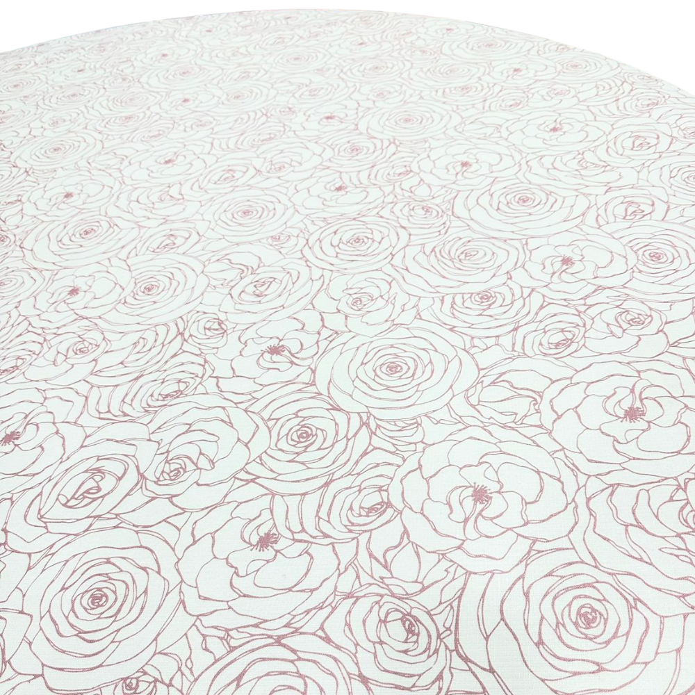 A round tablecloth in pink featuring a charming floral pattern. This elegant tablecloth adds a touch of sophistication and warmth to your dining setting, ideal for both casual meals and special occasions. The soft pink color and floral design create a delightful and inviting atmosphere.