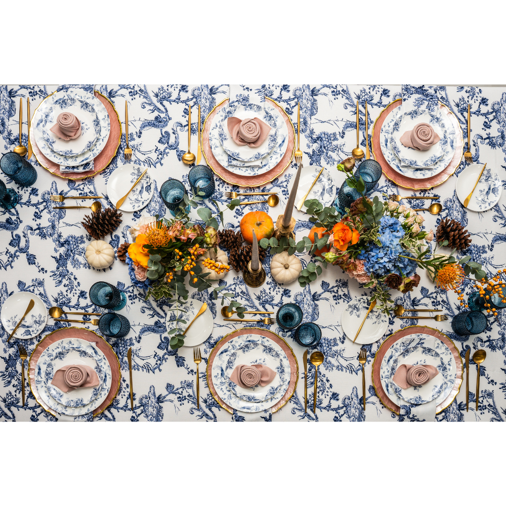 A round tablecloth with a Toile de Jouy print in dark blue, made from a polyester-linen blend fabric. This elegant tablecloth features intricate and classic patterns, adding a touch of sophistication and charm to your dining setting, perfect for both casual and formal occasions.