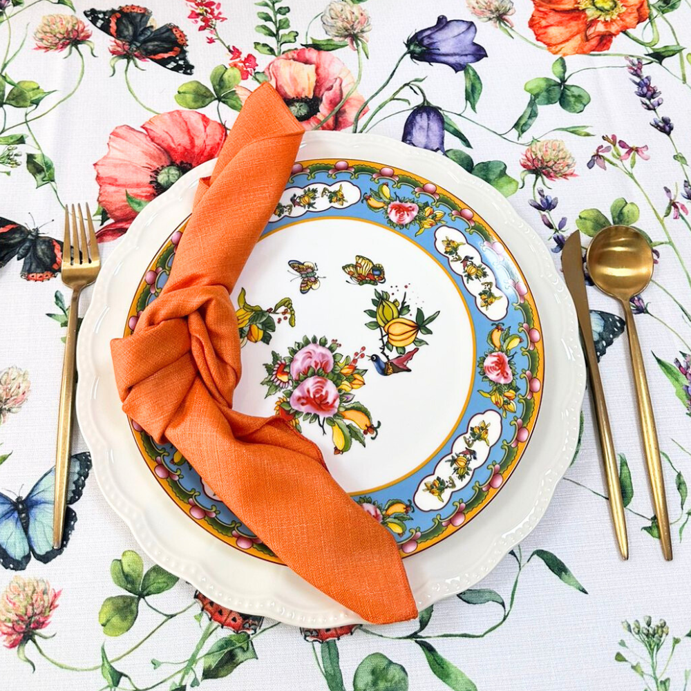 Floral patterned plates featuring intricate, colorful flower designs, ideal for adding elegance and charm to any dining table.