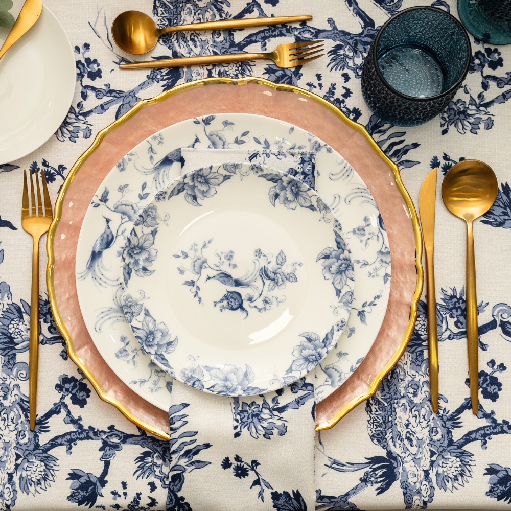 Vibrant plates featuring a detailed blue peacock design, perfect for adding a touch of elegance and color to any dining setting.