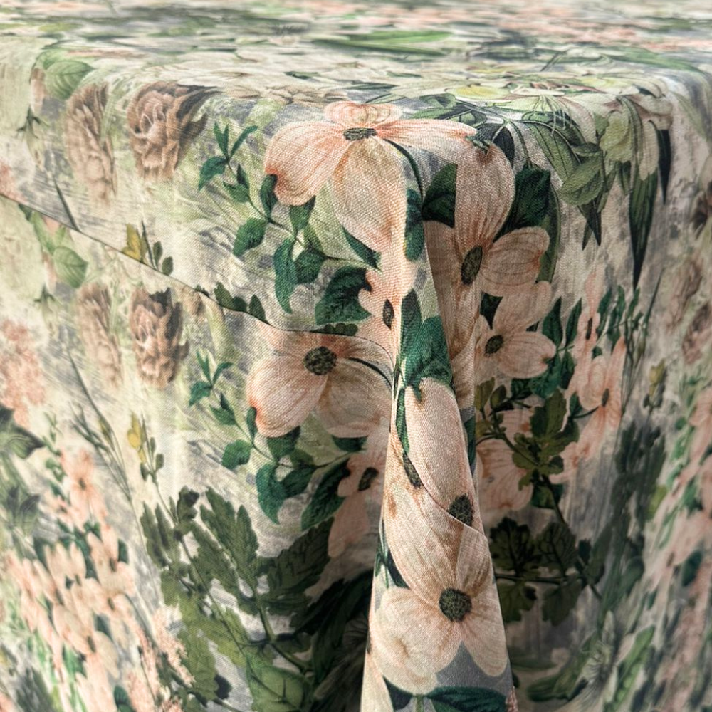 A designer green floral rectangular tablecloth featuring an elegant and intricate floral pattern in varying shades of green. This high-quality tablecloth adds a sophisticated and stylish touch to your dining table. Made from durable, easy-to-clean fabric, it’s perfect for both everyday use and special occasions. Measuring 360cm L x 280cm W, it provides ample coverage and enhances any table setting with its refined and timeless design.