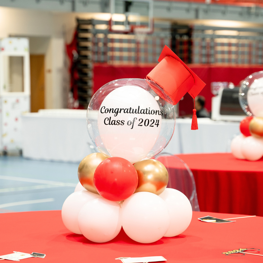 Vibrant balloon tabletop decor, ideal for adding a festive touch to any event. Featuring a colorful assortment of balloons, this eye-catching centerpiece is perfect for birthdays, weddings, and other celebrations. It brings a lively and cheerful element to any table setup, enhancing the overall atmosphere.