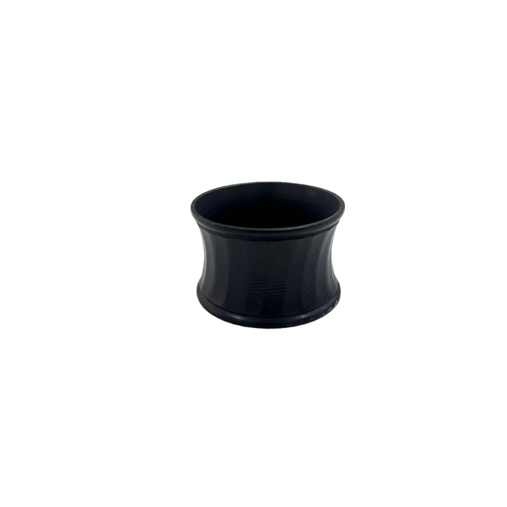 A black-lined napkin ring featuring a sleek and modern design. This elegant napkin ring adds a touch of sophistication to your table setting, with its distinctive black lining providing a stylish contrast. Ideal for formal dining and special occasions, it enhances the presentation of your napkins with a refined and contemporary look.