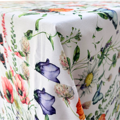 A Butterfly Meadows rectangular tablecloth featuring a whimsical, nature-inspired design with colorful butterflies and floral elements. This high-quality tablecloth, measuring 360cm L x 280cm W, brings a touch of charm and elegance to your dining area. Made from durable, easy-to-clean fabric, it’s perfect for adding a vibrant and playful touch to both casual meals and special events. Available in this generous size, it enhances your dining experience with its unique and eye-catching design.