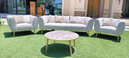 A single-seater sofa with a sand-textured fabric, featuring a sophisticated and comfortable design. The sand texture adds a subtle and elegant touch, while the single-seater shape provides a cozy and stylish seating option for any living space.