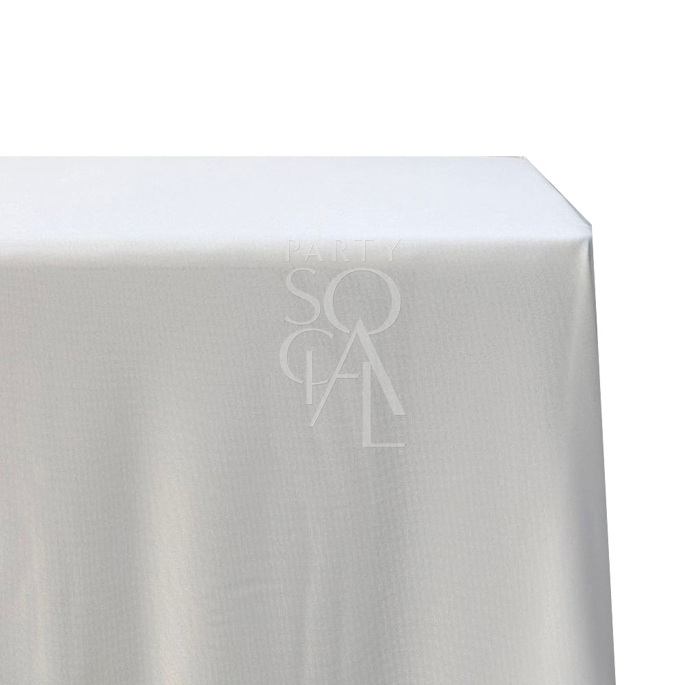 A rectangular cotton-linen tablecloth in crisp white, featuring a classic and clean design. This versatile tablecloth adds a fresh and timeless touch to any dining setting, perfect for both everyday use and formal occasions.