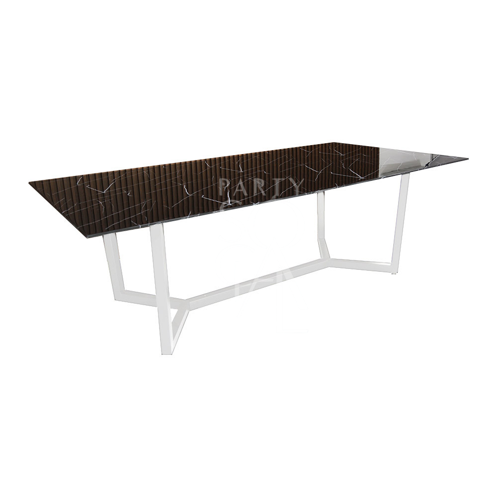 A table with a white base and a black marble top, featuring a sleek and modern design. The crisp white base provides a striking contrast to the rich black marble top, creating a bold and elegant look. This table enhances any decor with its contemporary and sophisticated style.