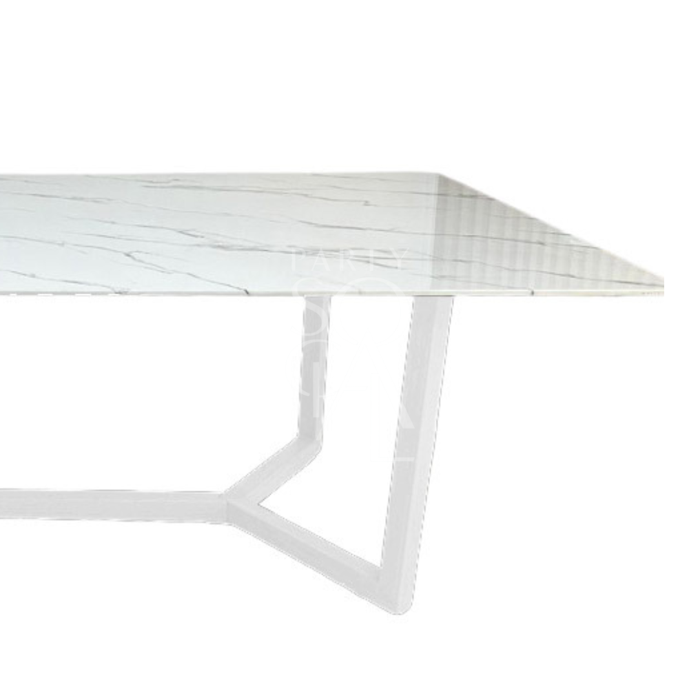 A table with a white base and a white marble top, featuring a clean and elegant design. The matching white base and marble top create a seamless and sophisticated look, adding a touch of modern refinement and brightness to any decor.