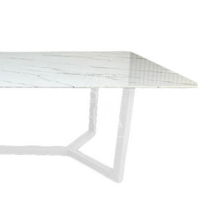 A table with a white base and a white marble top, featuring a clean and elegant design. The matching white base and marble top create a seamless and sophisticated look, adding a touch of modern refinement and brightness to any decor.