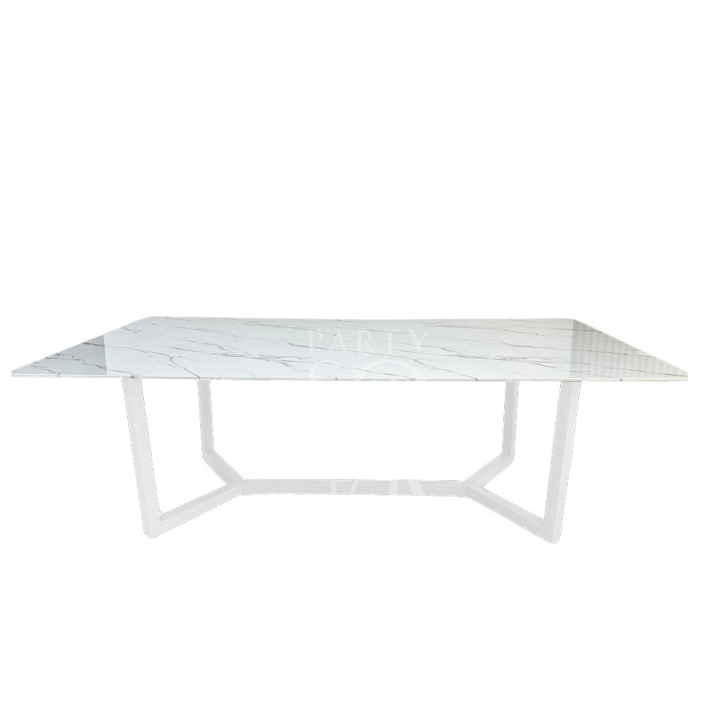 A table with a white base and a white marble top, featuring a clean and elegant design. The matching white base and marble top create a seamless and sophisticated look, adding a touch of modern refinement and brightness to any decor.