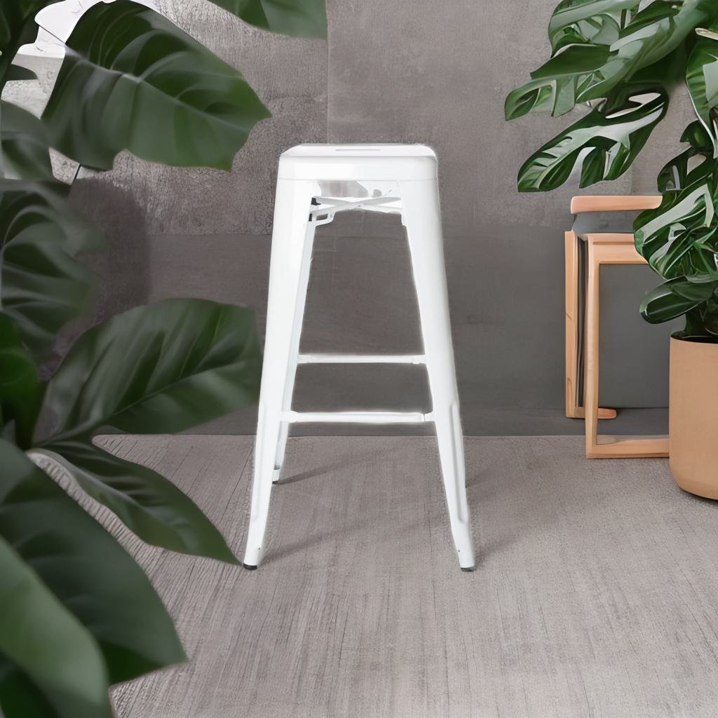 Modern white metal bar stool featuring a sleek, minimalist design with a clean, crisp finish. The stool’s sturdy metal frame offers both durability and style, complemented by a comfortable seat, making it a stylish and functional addition to any bar or high-top table.