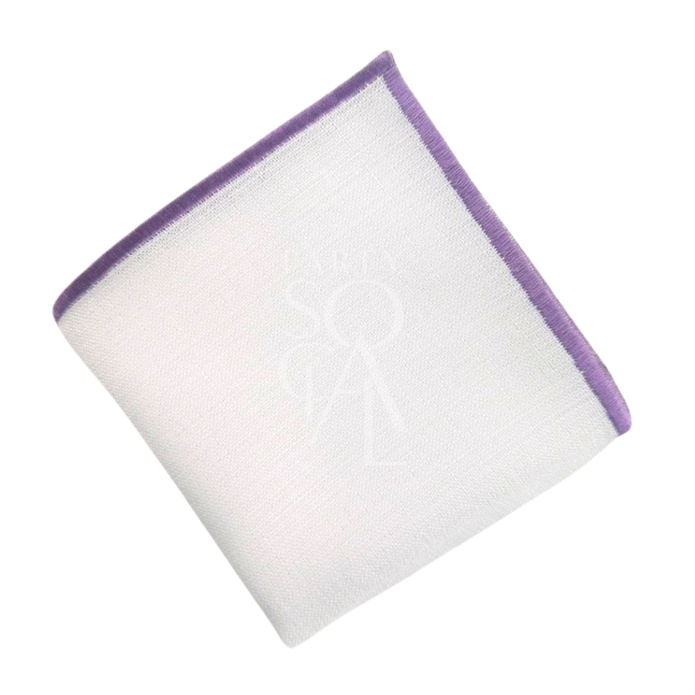 White napkin featuring a delicate lilac line border, adding a soft and charming detail. The lilac-lined accent brings a subtle, romantic touch to any table setting.