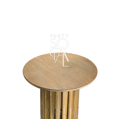 A wooden cocktail table featuring a sleek and modern design. This stylish table has a sturdy wooden construction, perfect for holding drinks and appetizers during gatherings and events. Ideal for adding a touch of rustic elegance and functionality to any bar area, lounge, or event space.